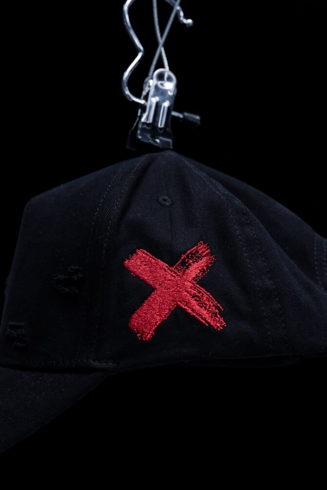 X Cap